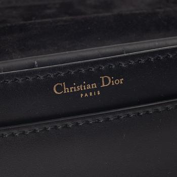 Christian Dior, A black leather "Dio(r)evolution" bag.