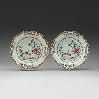 376. A pair of famille rose 'double peacock' dishes, Qing dynasty, Qianlong (1736-1795).