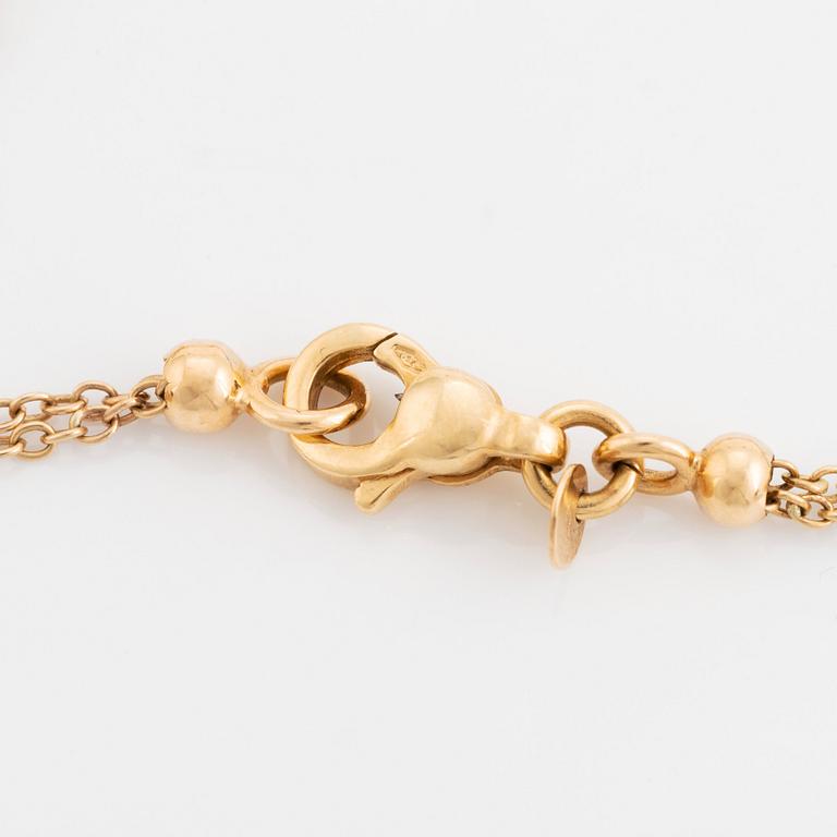 Collier 18K guld med runda briljantslipade diamanter.