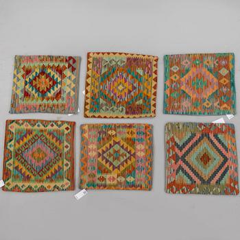 Six Afghan kelim pillows.