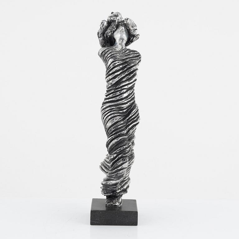 Frank Olsson, an aluminum sculpture, signed.