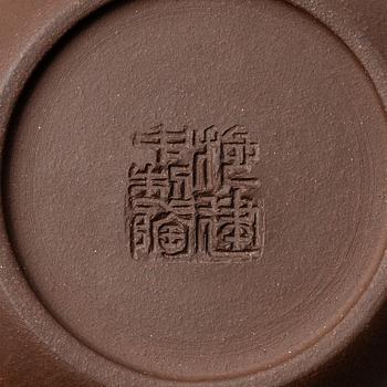 Two yixing teapots, China, 1980s and 2000.