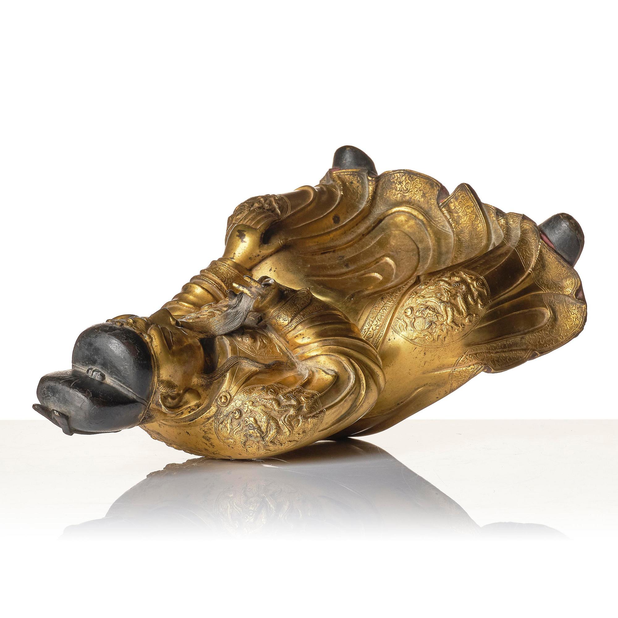 A large well cast figure of Guandi, Ming dynasty (1368-1644).