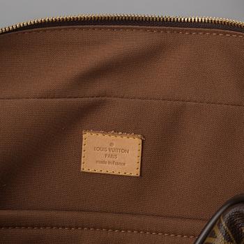 Louis Vuitton, a monogram canvas carry on bag.