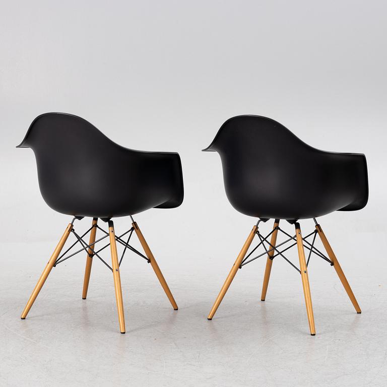 Charles & Ray Eames, a pair of "DAW" plastic chairs, Vitra, Italy, 2015.