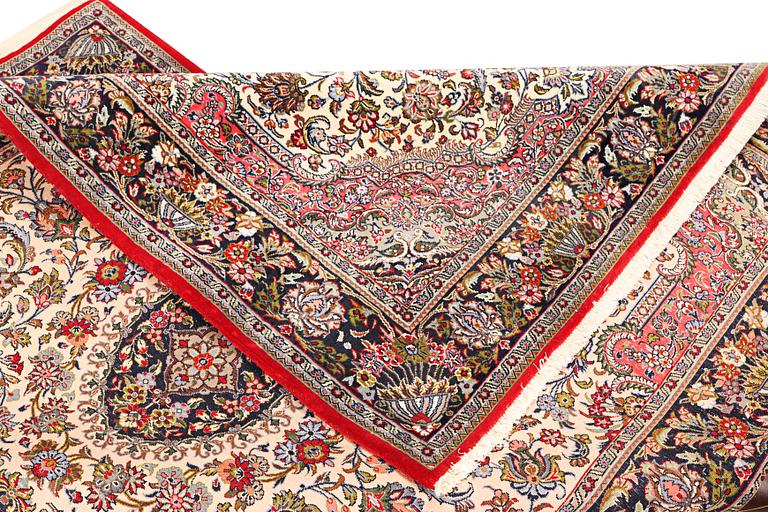 A Quum rug, c. 204 x 134 cm.