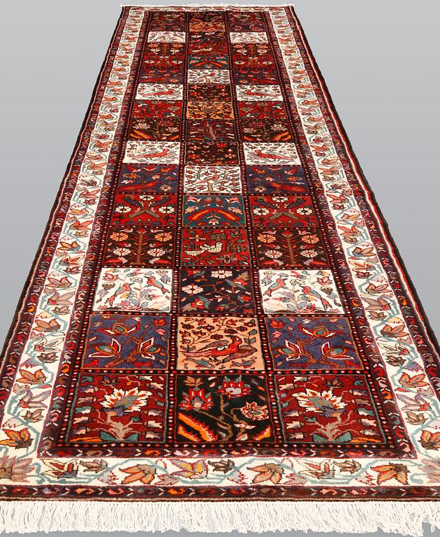 A pictoral Bakhtiari carpet, ca 400 x 115 cm.