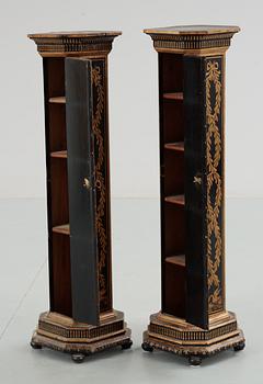 A pair of late 19th century pedestal cupboards.