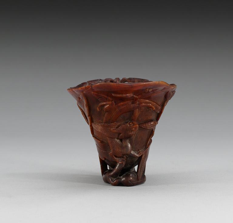 A rhinoceros horn libation cup, Qing dynasty, Kangxi (1662-1722).