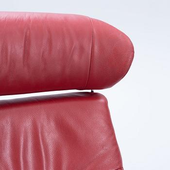 A pair of armchairs with footstool, "Timeout" by Conform, late 20th century.