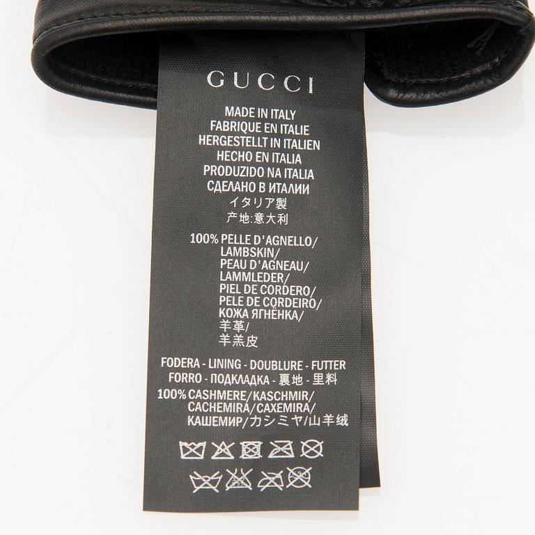 A pair of Gucci ladies' leather gloves.
