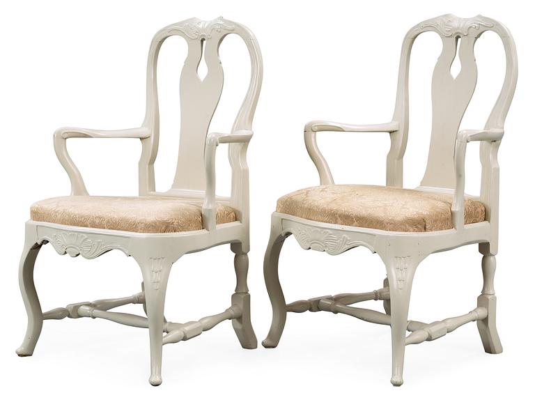 A pair of Swedish 18th Cenury Rococo armchairs.