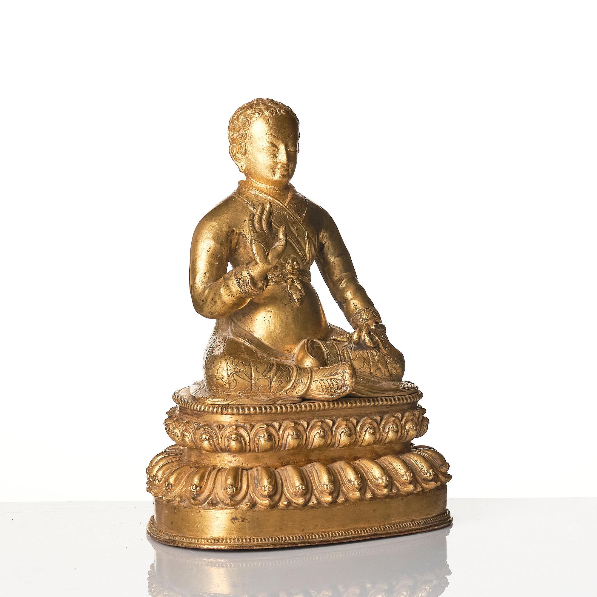 A gilt copper alloy figure of a Lama, most likely Sonam Tsemo, Tibet, probably 16/17th century.
