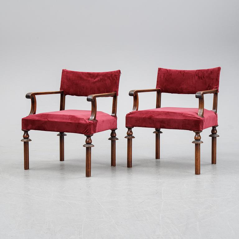 A pair of Swedish Grace 1920's armchairs.