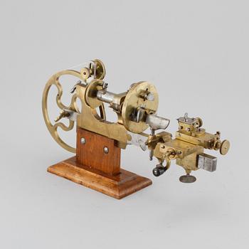 A hand powered lathe for watchmakers by R Flume in Berlin, 19th century.