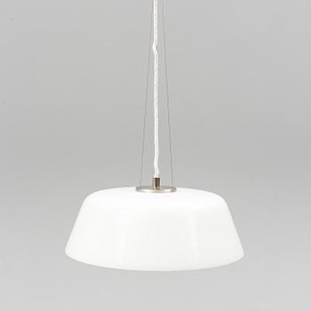 An Arne Jacobsen "Centenary Package" comprising three "Ant Chairs" and an eggshaped table, Fritz Hansen, Denmark.