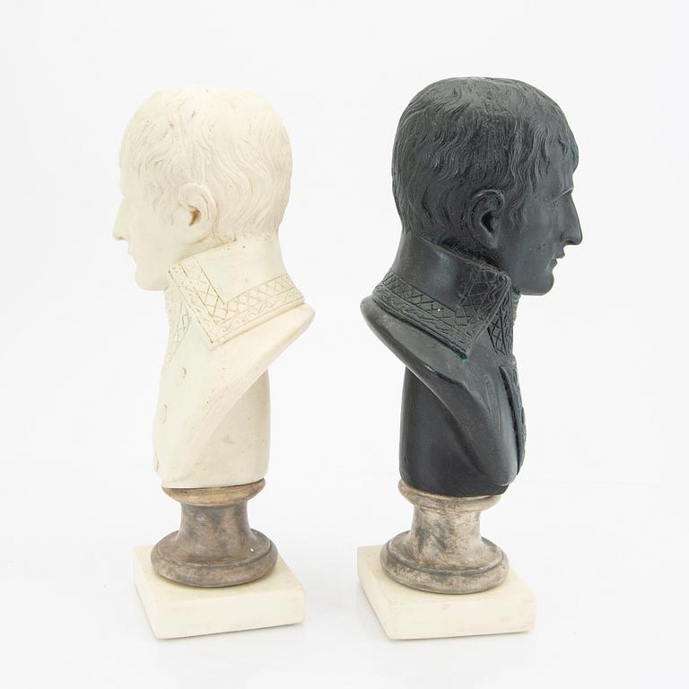 A pair of modern plaster statues of Napoleon.