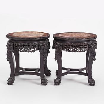 A pair of Chinese hardwood marble top tables, circa 1900.