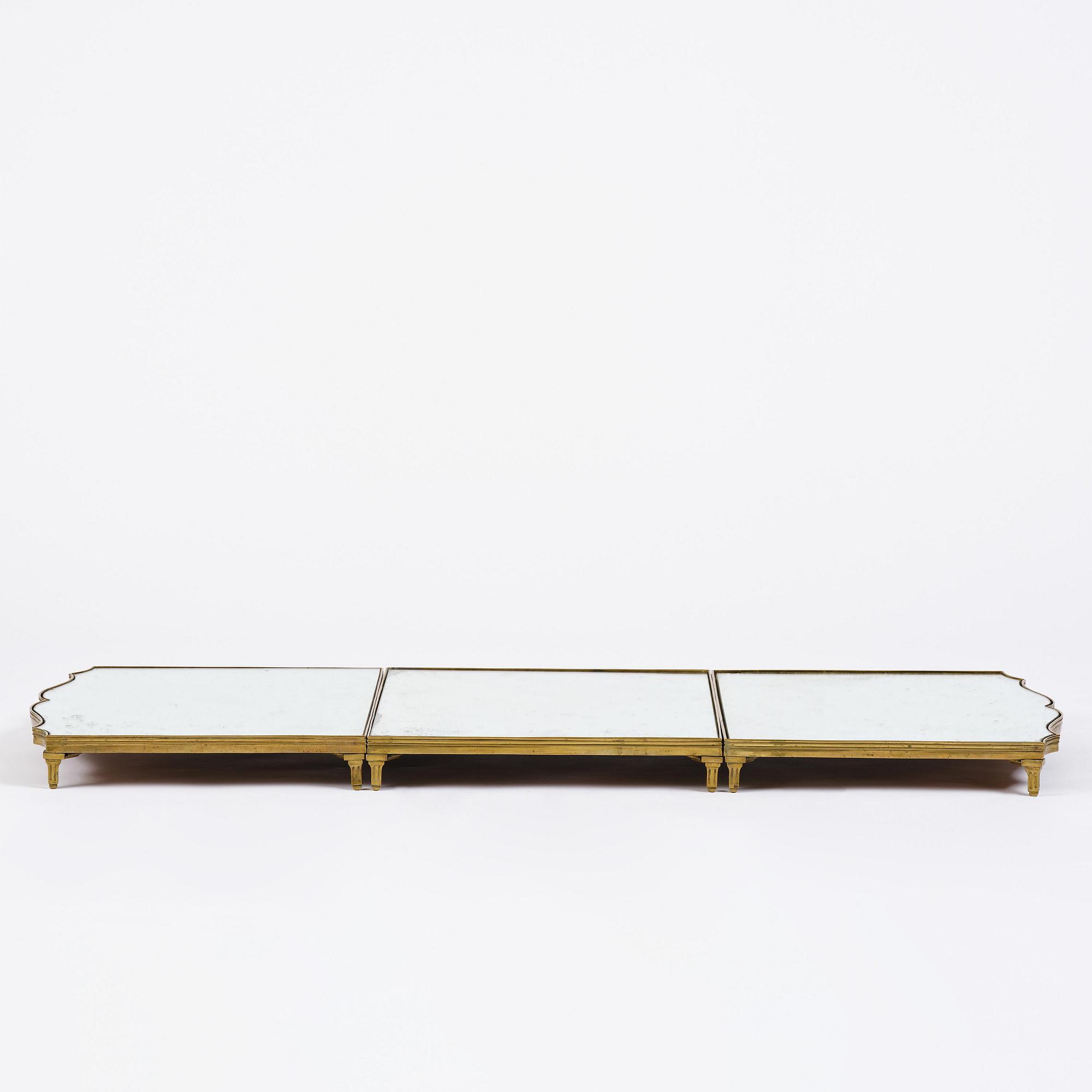 A Gustavian three-piece brass and glass surtout de table, Stockholm, later part 18th century.