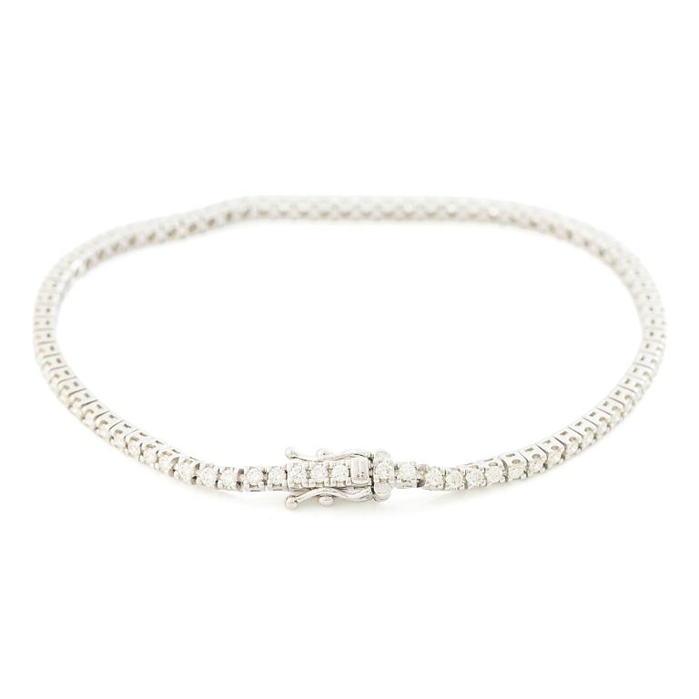 Tennisamband, 18K vitguld med briljantslipade diamanter.