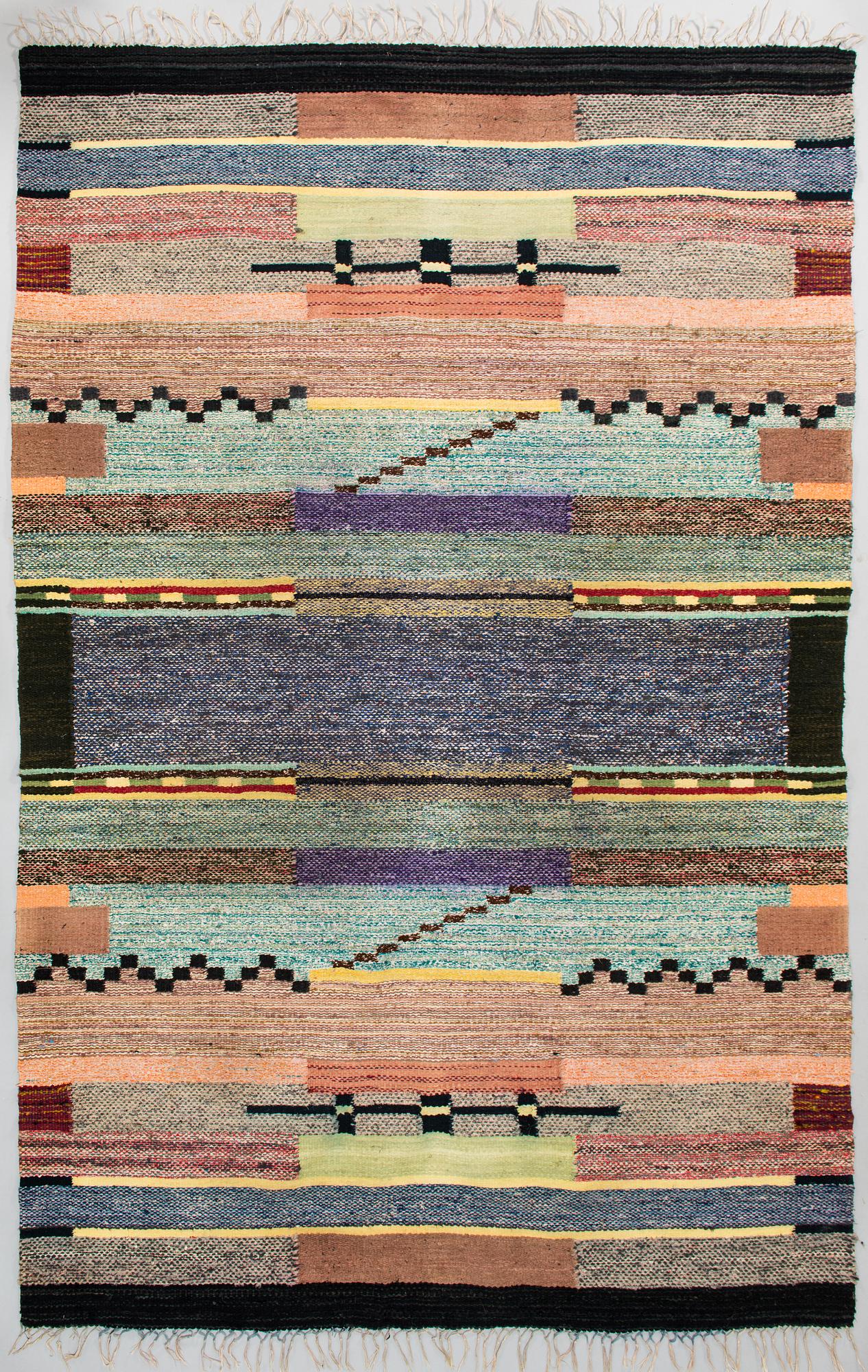 A 1930's Finnish rag rug. Circa 270 x 180 cm.