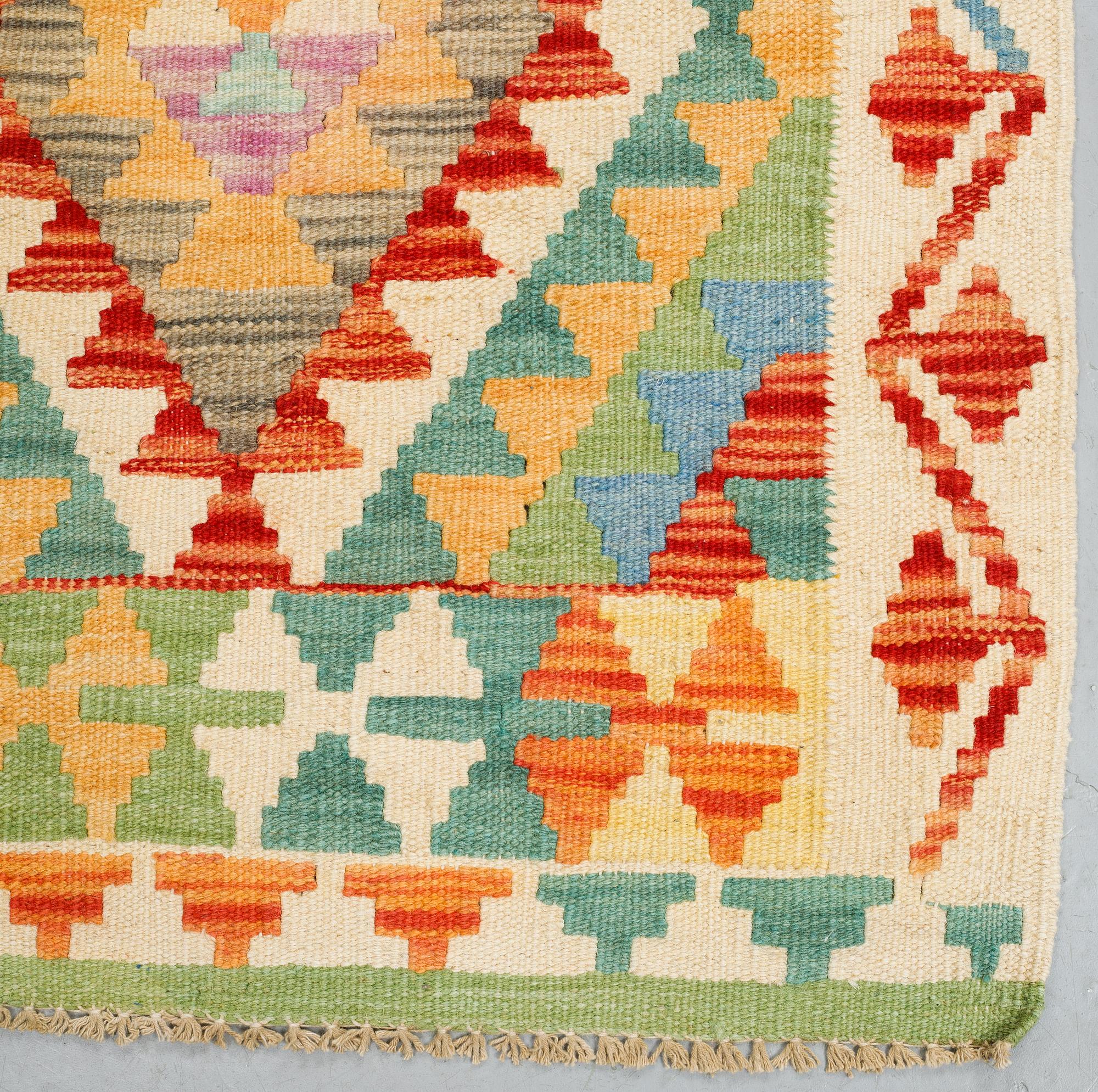 A runner, kilim, ca 199 x 66 cm.