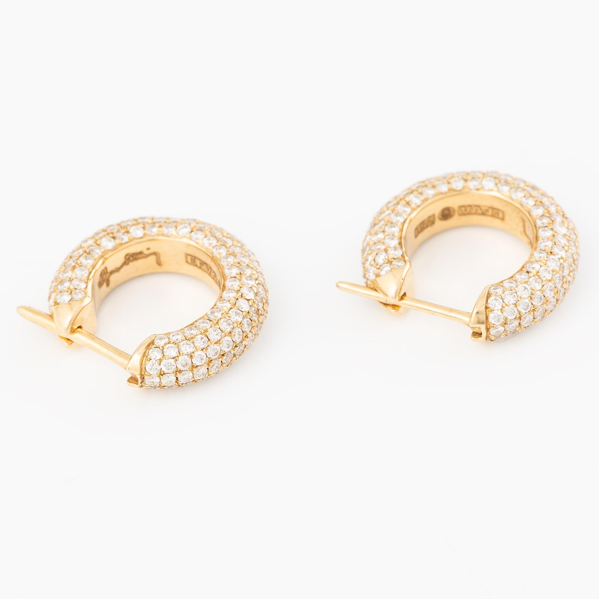 Efva Attling, örhängen, ett par, "Million Stars Creol", 18K guld med briljantslipade diamanter.