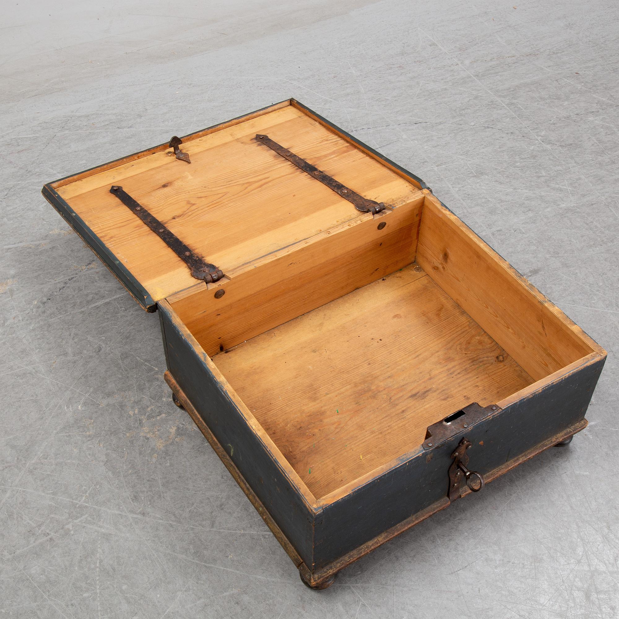 A painted wooden box, marked 1760.