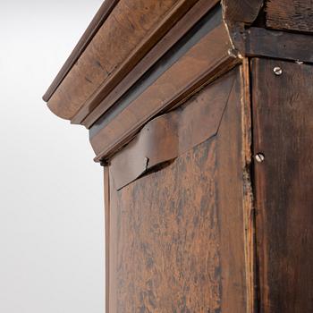 A burr alder, elm, and gilt-brass mounted late Baroque cabinet, first part of the 18th century.