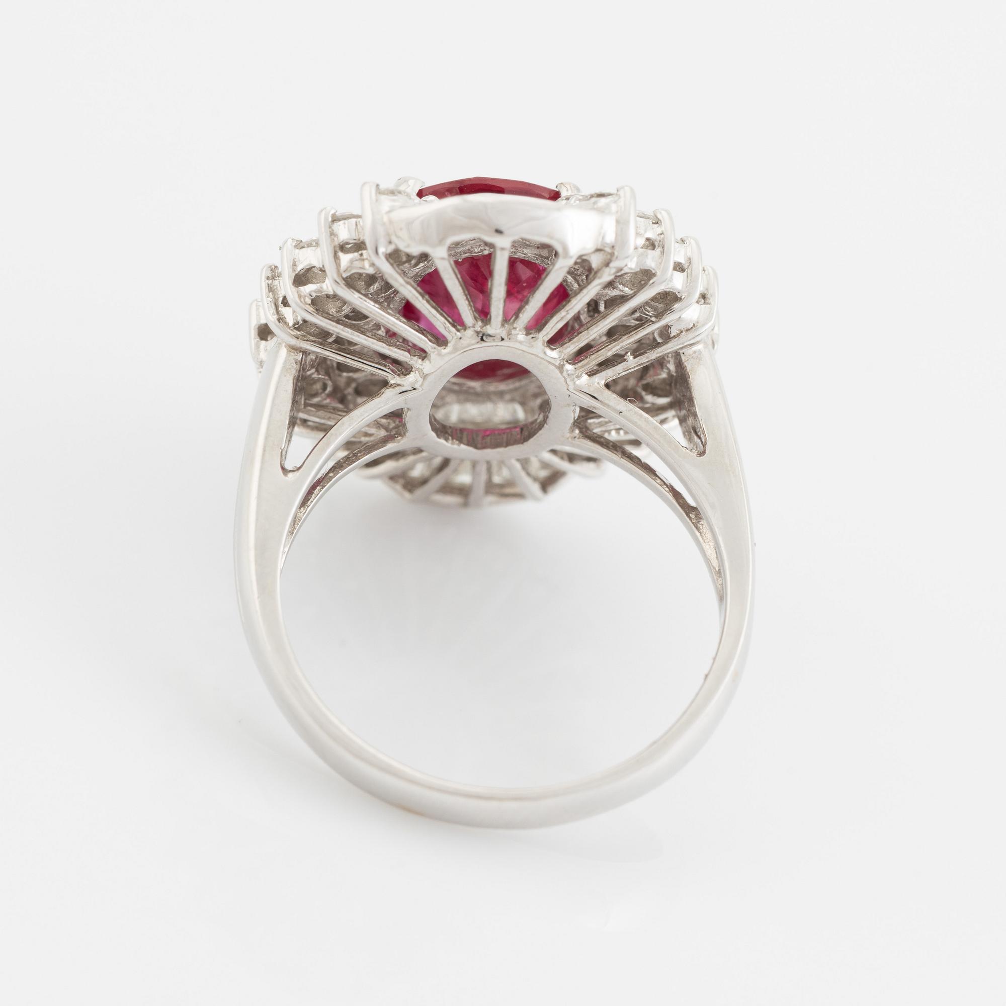Ruby, baguette- and brilliant cut diamond ring.