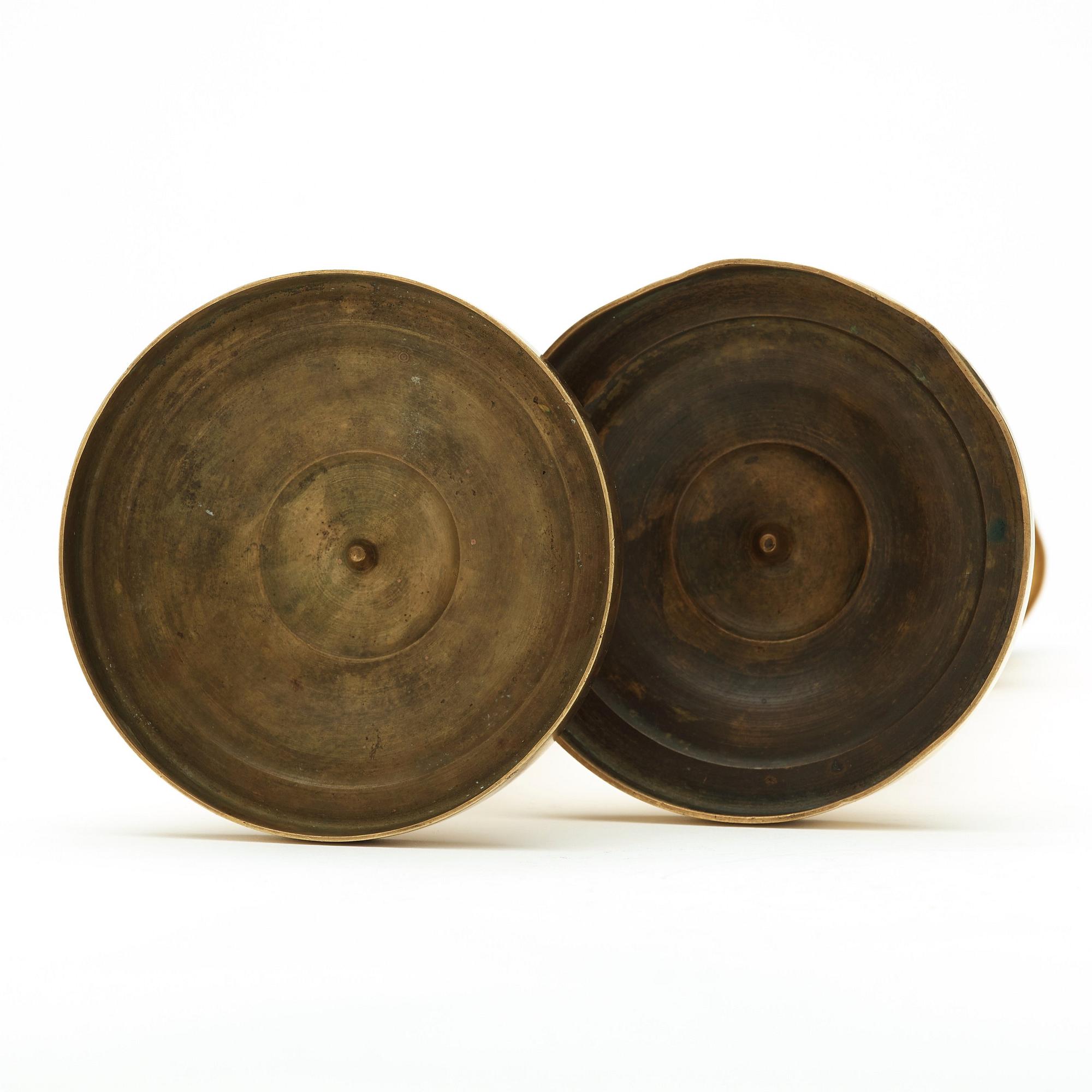 A pair of French mid 19th century candlesticks.