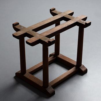 Axel Einar Hjorth, a red limestone top and stained pine side table, Nordiska Kompaniet, Sweden 1929.