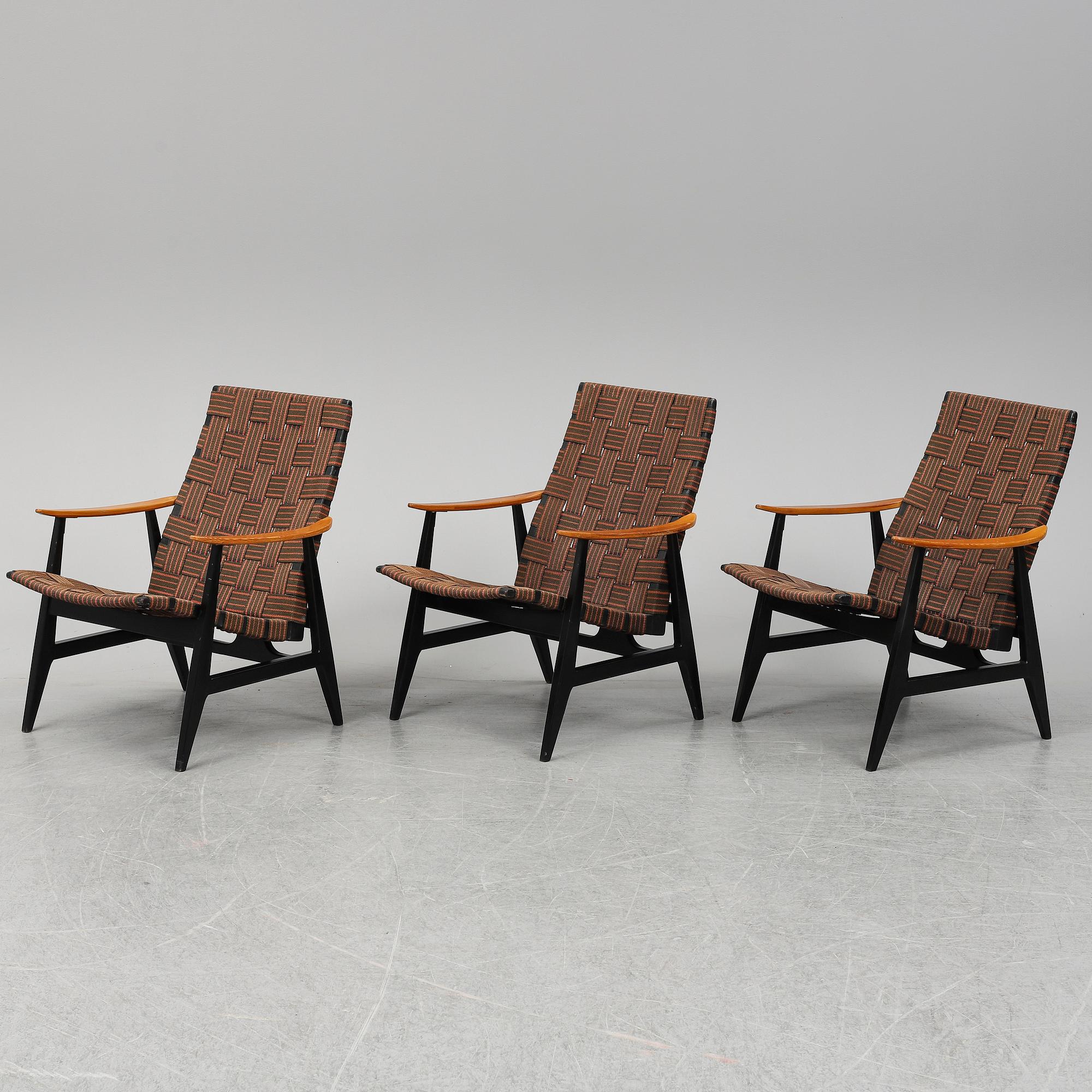 A set of three 1950's easy chairs.