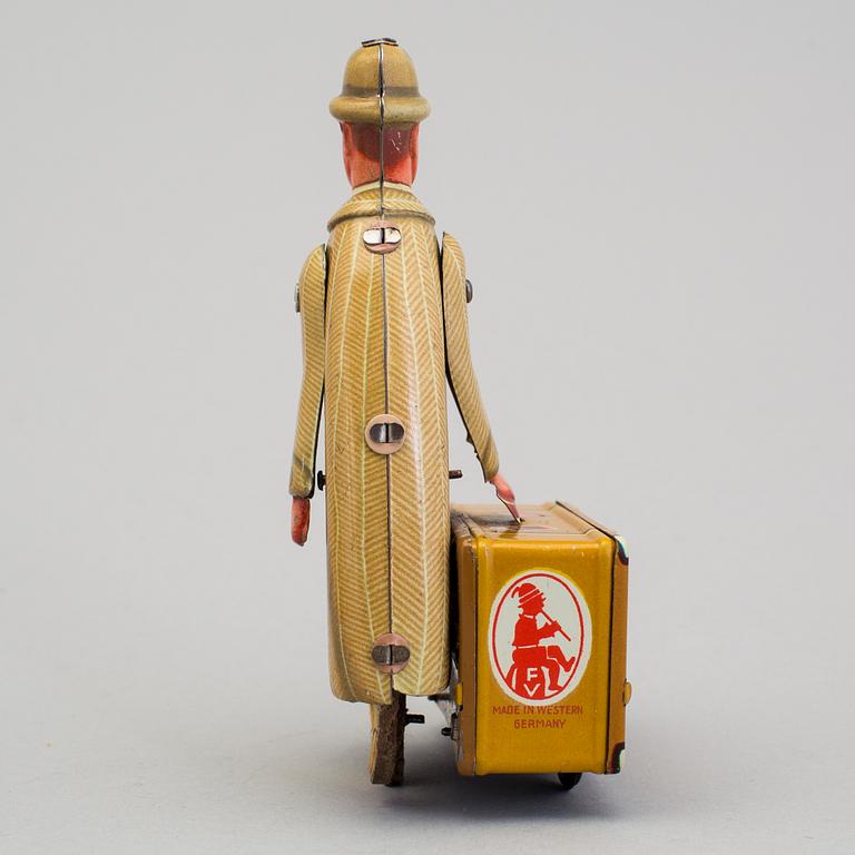 A tinplate Fritz Voith man with suitcase, Germany, 1950s.