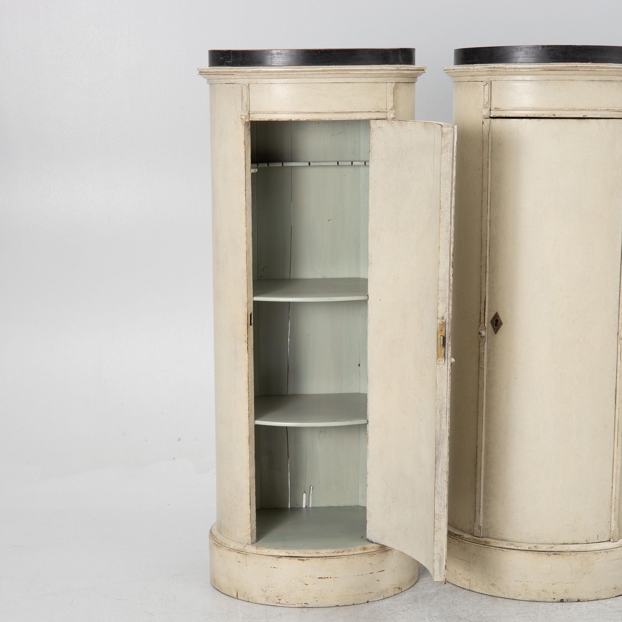 A pair of column cabinets, 19th century.