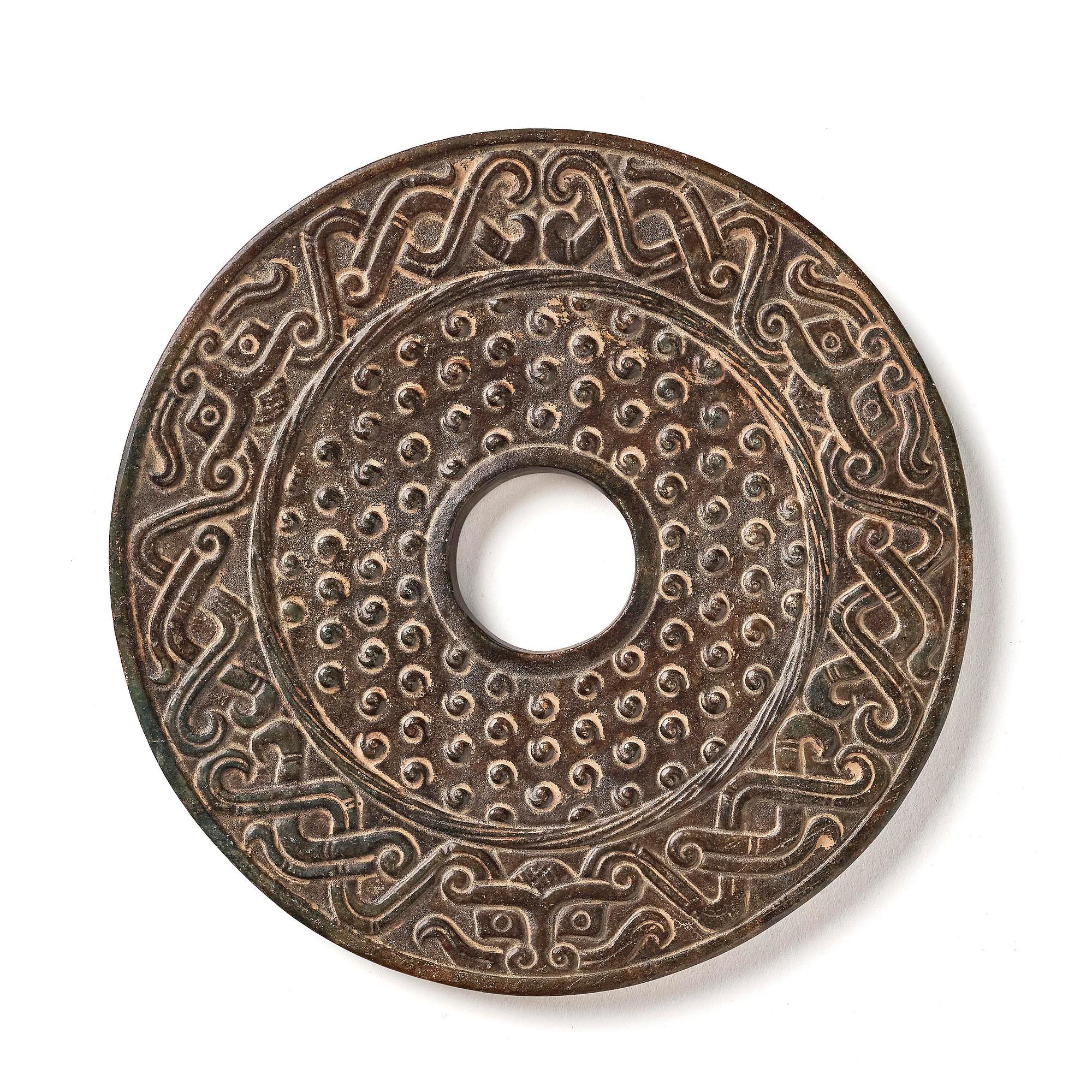 An archaistic bi disc.