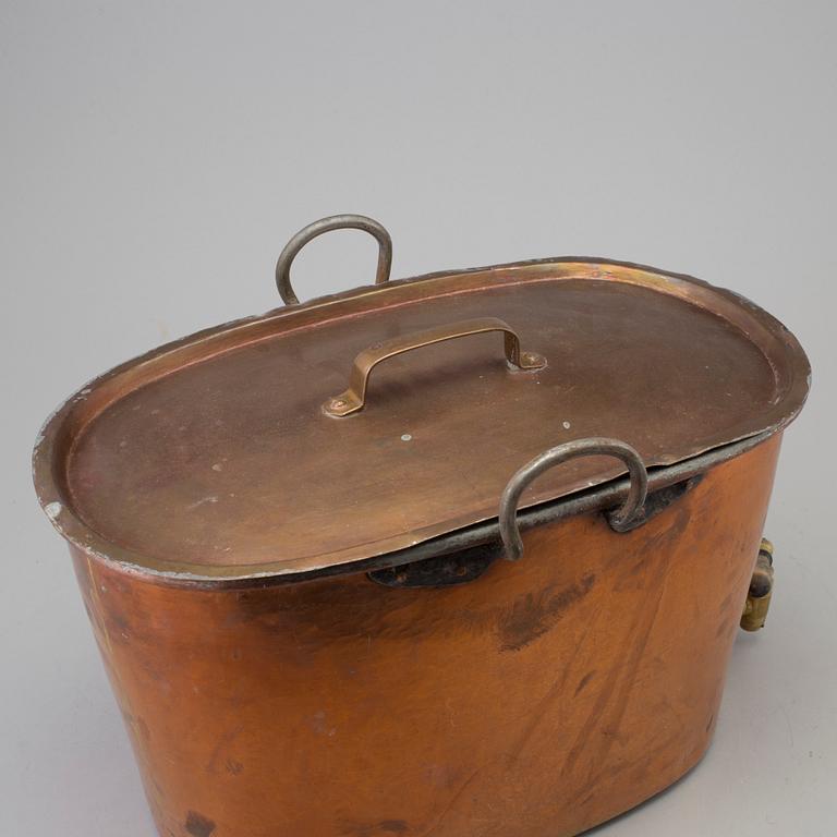 A 19th century copper container.