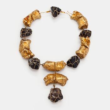 Björn Weckström, "Offering lambs", a 14K gold and smoky quartz necklace. Helsinki 1964.