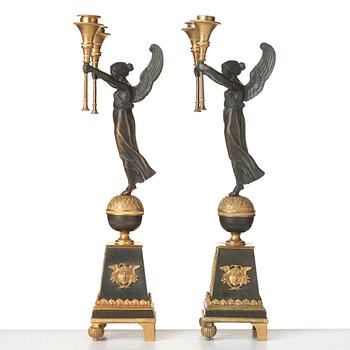 A pair of Empire-style 20th century candelabra.