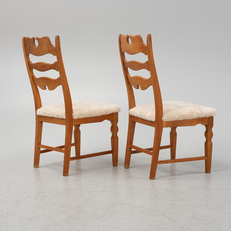 Henning Kjærnulf, a set of six oak 'Razorblade' chairs with new sheepskin upholstery, EGK, Denmark 1960s.
