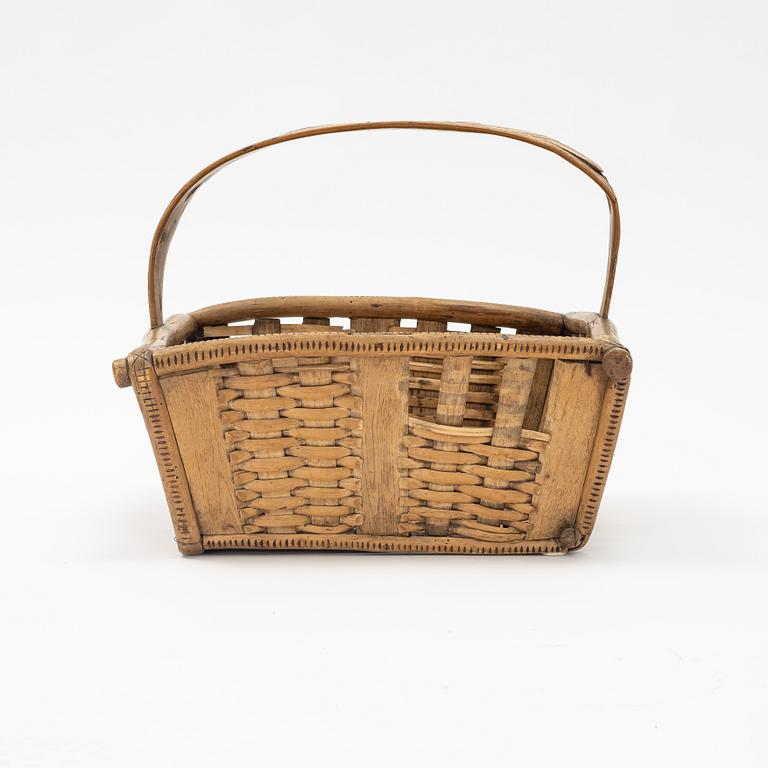 A wicker basket,  dated 1746.