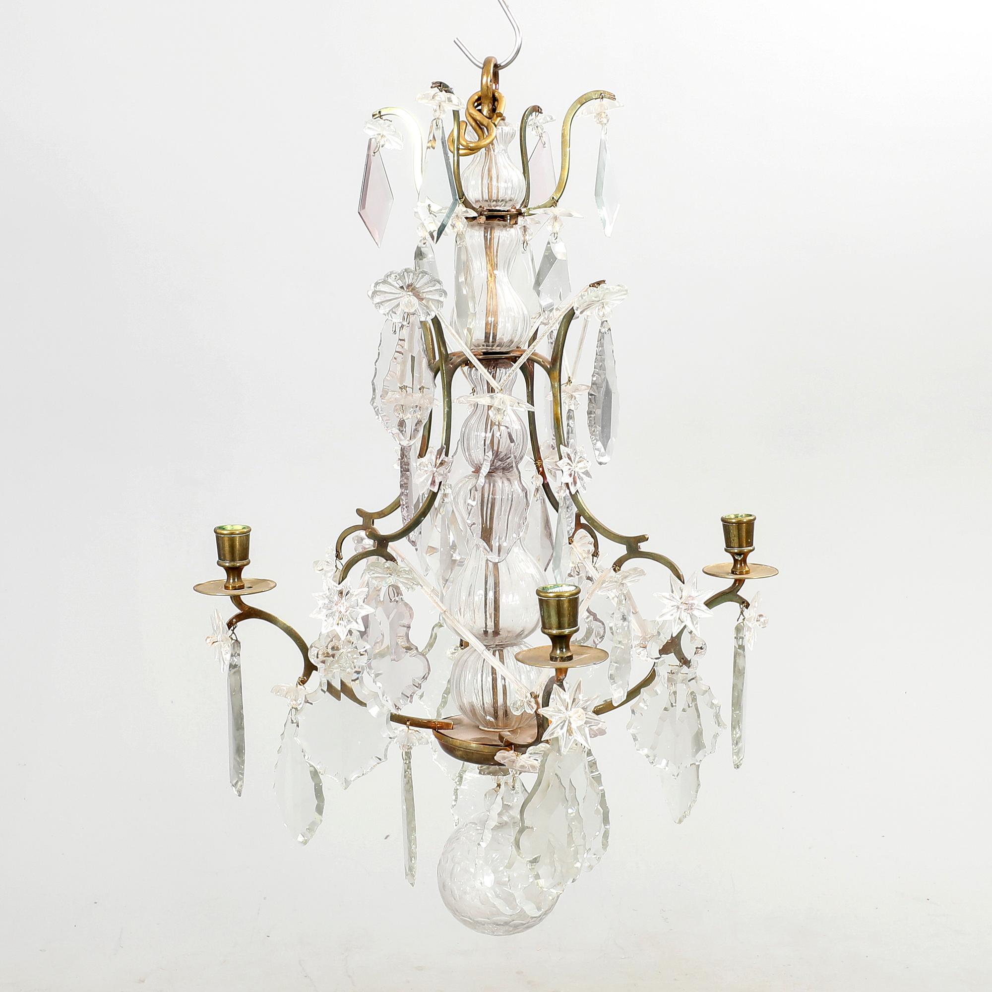 A Rococo style chandelier around 1900.