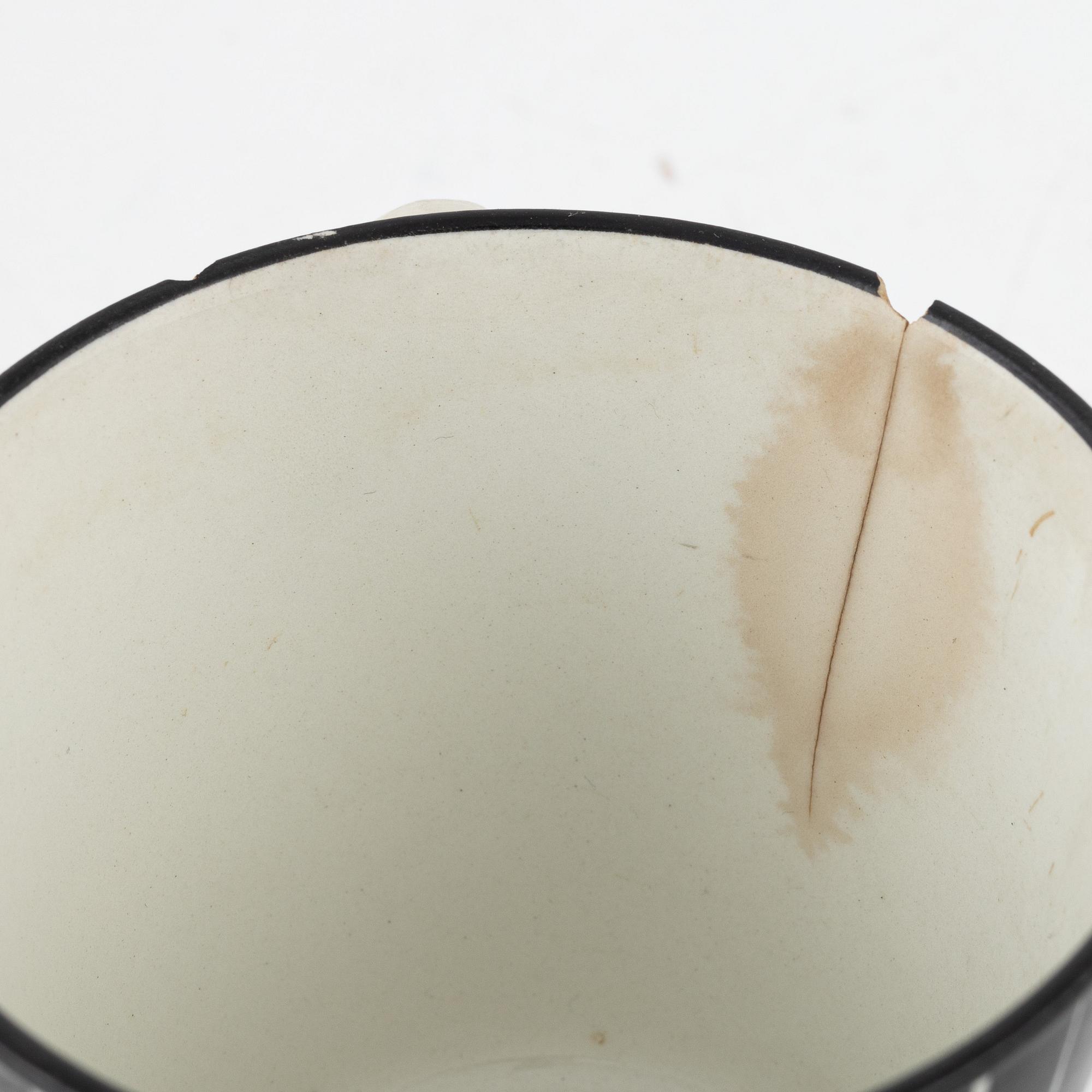 Eugen Trost, eleven coffee cups with three saucers, 'Zebra', Upsala-Ekeby Gefle.