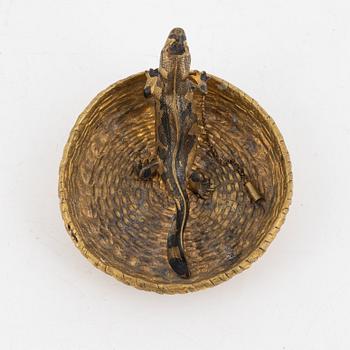 An ashtray, circa 1900.