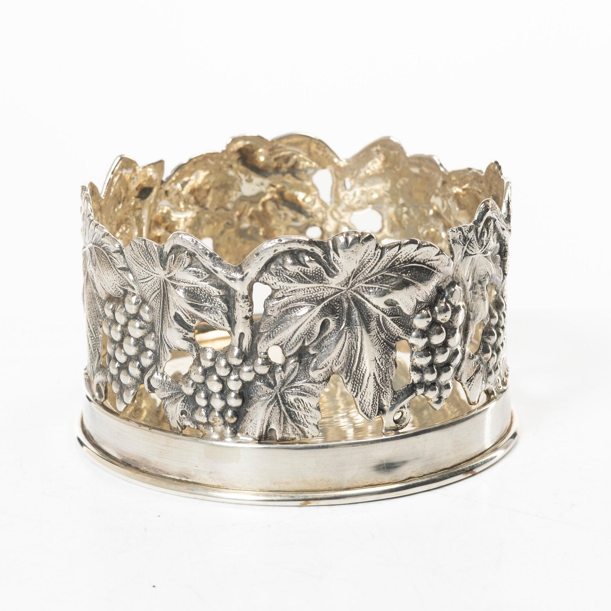 Coaster, sterling silver, 20th century.
