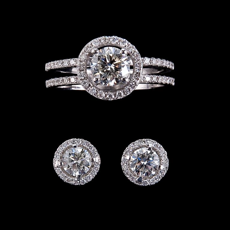 A RING AND A PAIR OF EARRINGS, brilliant cut diamonds. 1.00 ct + 0.35 ct. in ring. 0.80 ct. in earrings.