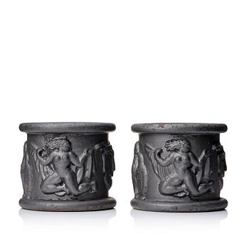 253. Anna Petrus, a pair of Swedish Grace cast iron garden urns 'Blomkruka nr 1', Näfveqvarns Bruk, Sweden.