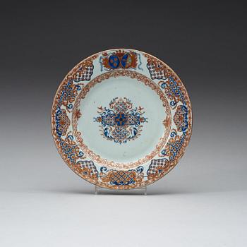 497. An enamelled armorial dinner plate, Qing dynasty, Yongzheng (1723-35).
