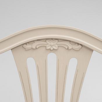 A Gustavian Style Dining Table and 10 Chairs, second half of the 20th Century.