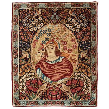 A RUG. A semi-antique Kerman Laver figural. 79,5 x 64,5 cm.